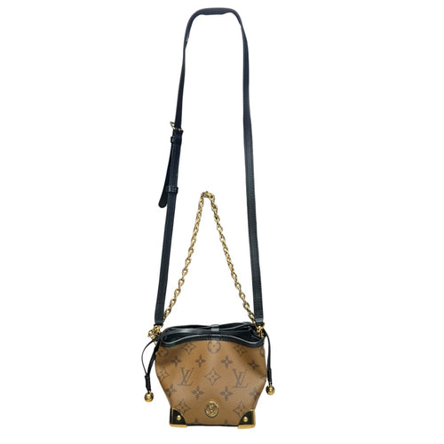 LOUIS VUITTON Monogram Reverse Dauphine Mini Crossbody Bag LO2312