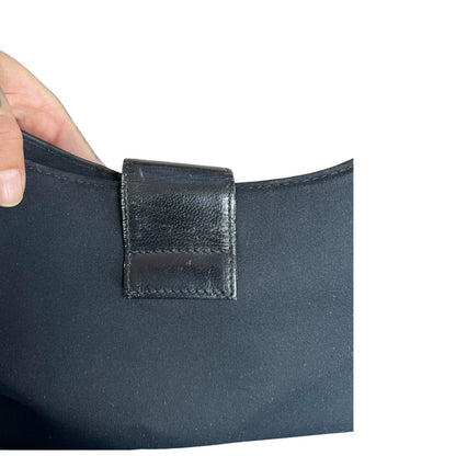 FENDI Nylon Canvas Baguette (though the shape is more of a hobo/shoulder bag, the buckle is iconic Fendi, often associated with Baguette styles) Shoulder Bag Black Silver Hardware Fe387